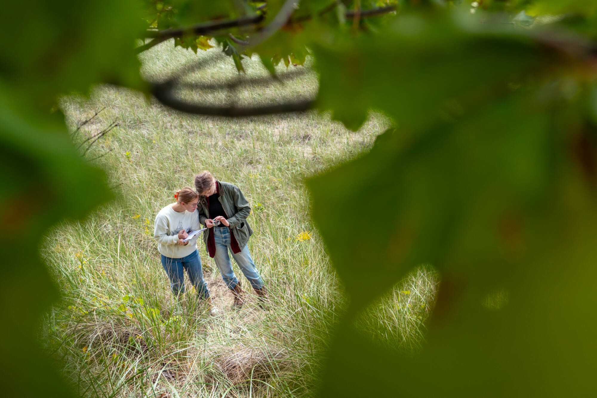Studentss work as part of a Geologic Field Methods class at Windsnest Park in West Olive
